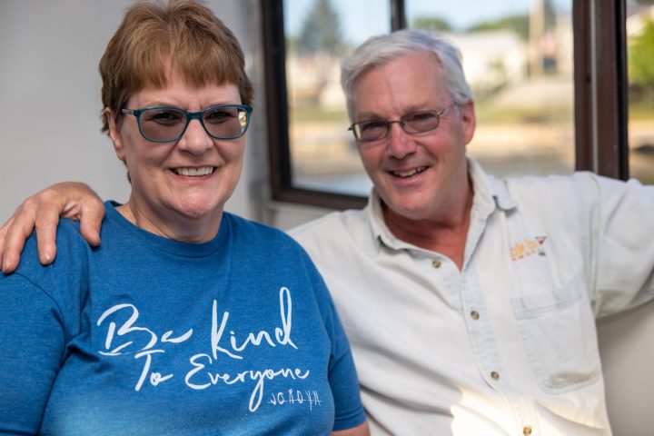 a man in a blue shirt