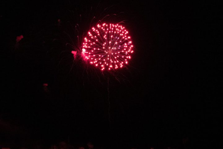 a close up of a stop light at night