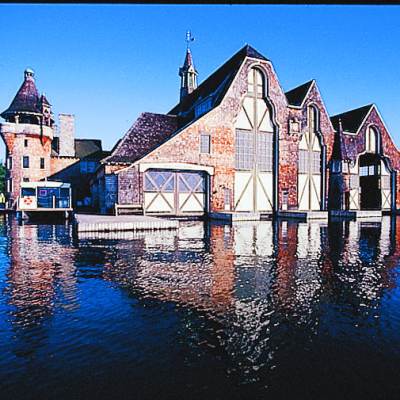 a small house in a body of water