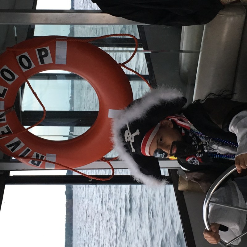 a person sitting on a boat in the water