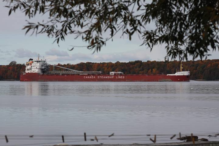 red ship in a body of water