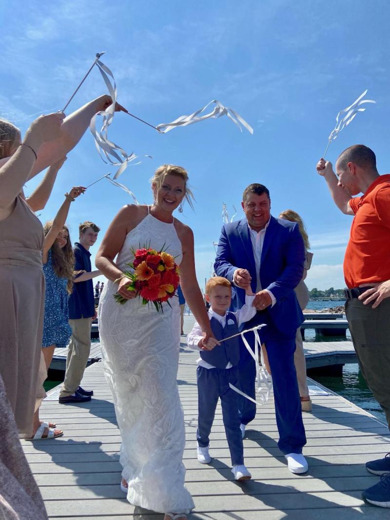 a group of people standing next to a person