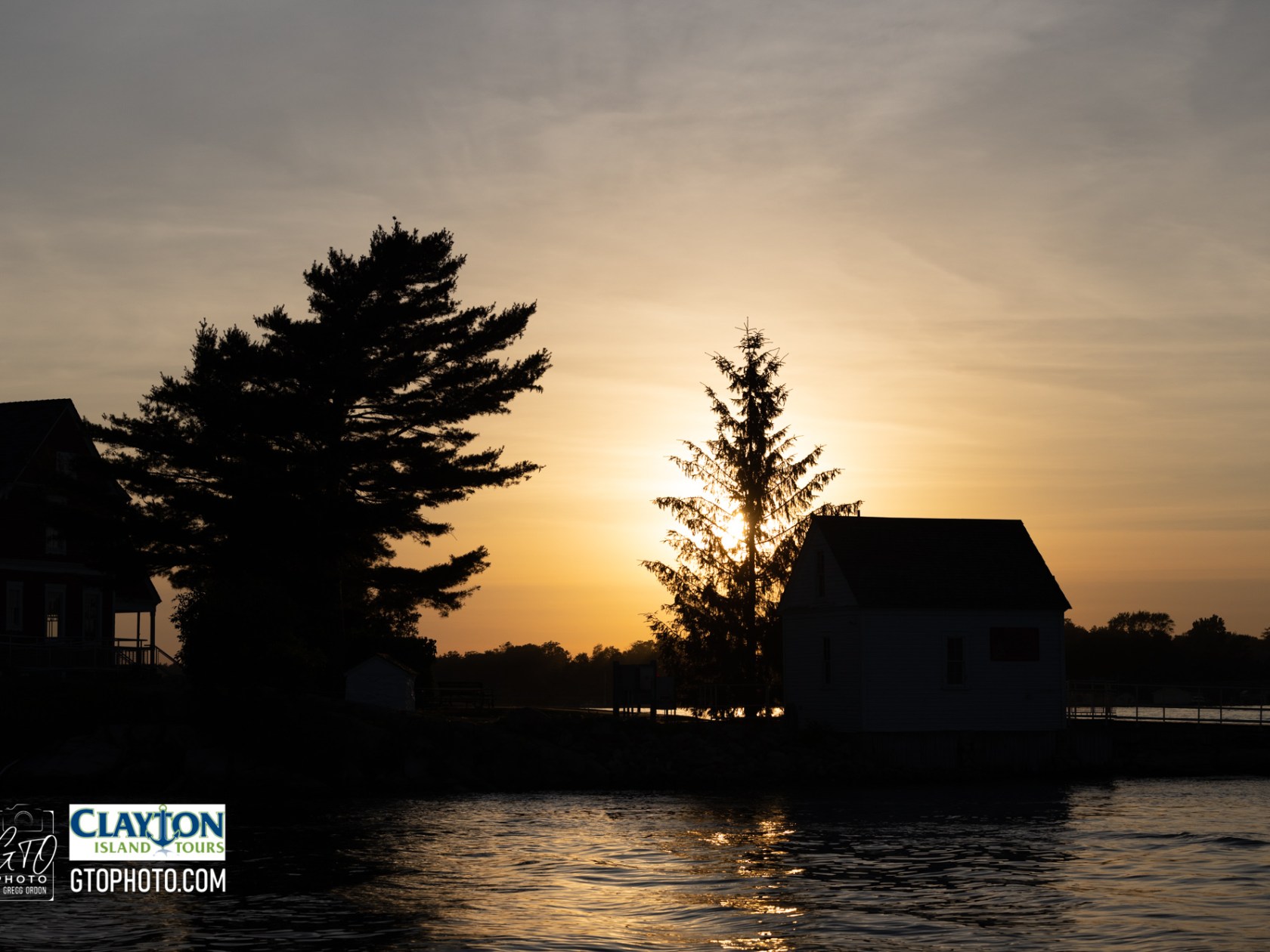 a sunset over a body of water