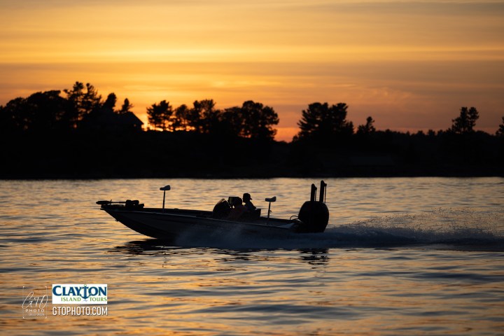 a small boat in a body of water