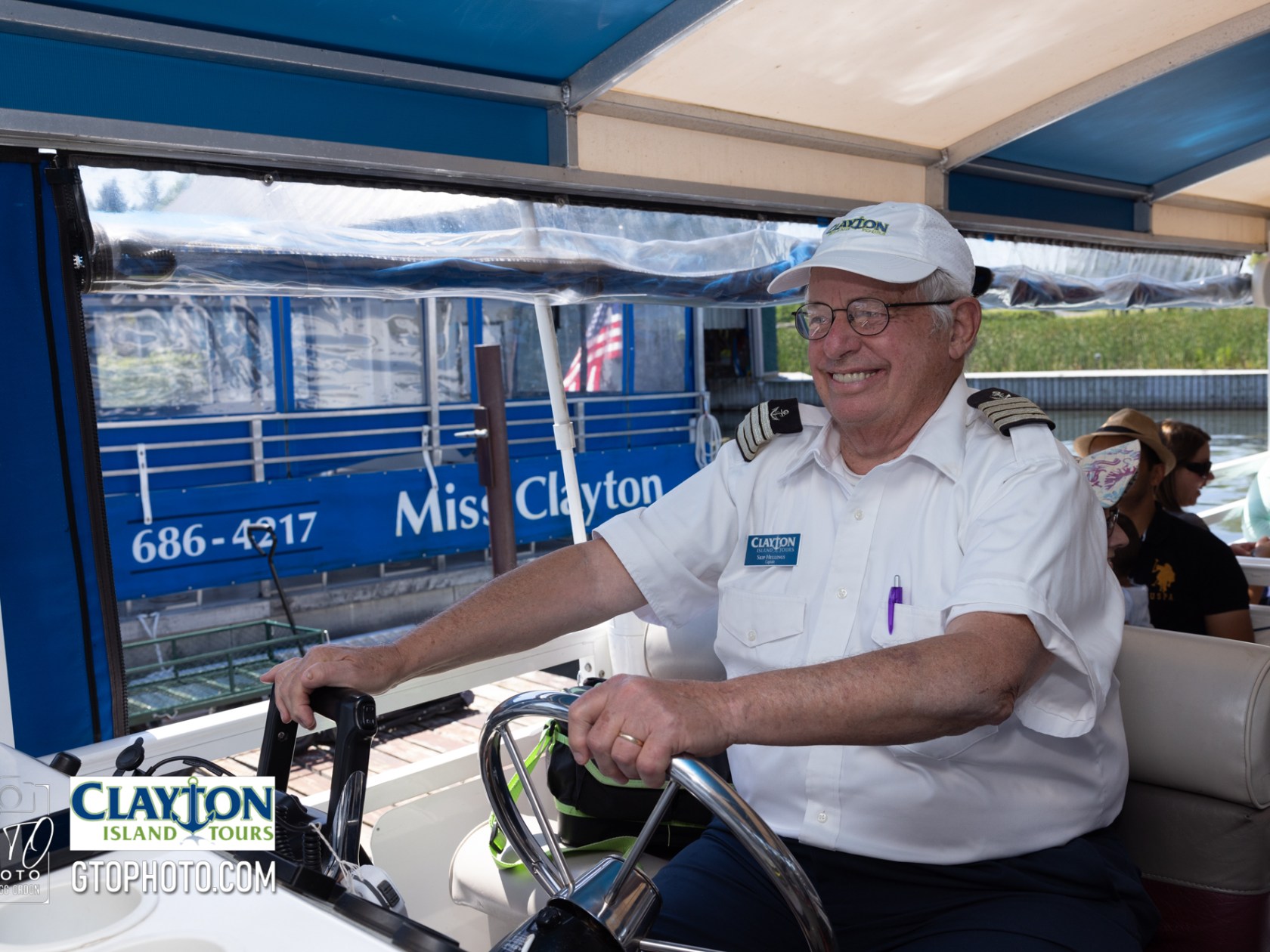 a man standing next to a bicycle