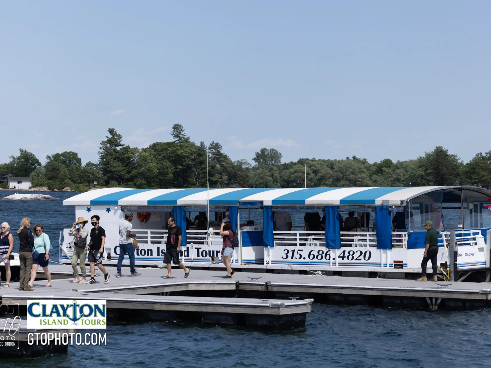 a group of people on a boat in the water