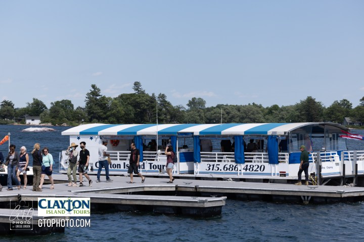 a group of people on a boat in the water