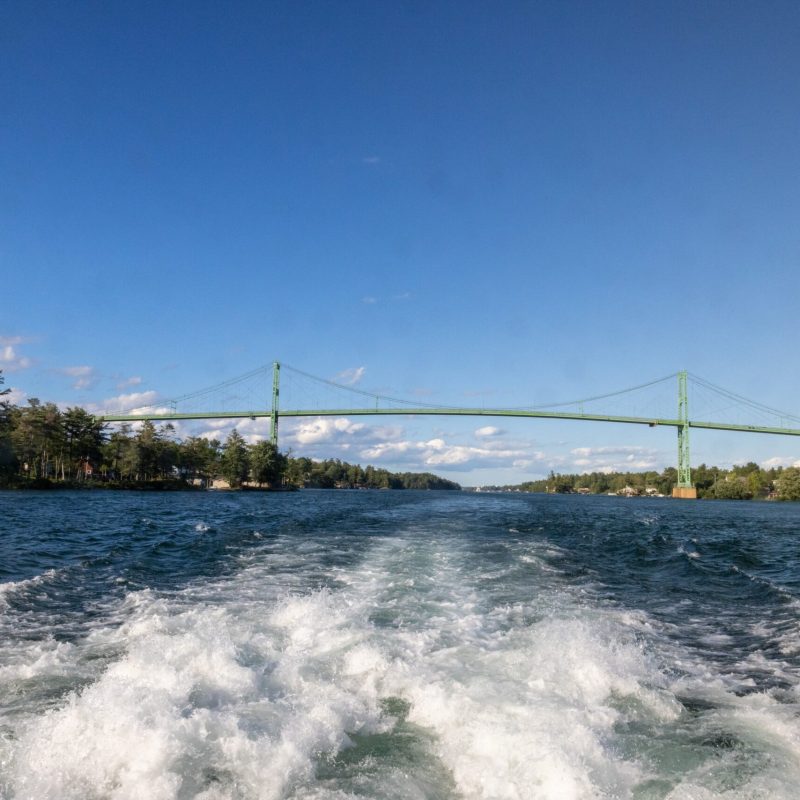 a man riding a wave on top of a body of water