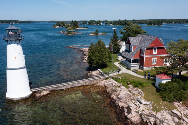 a small house in a body of water