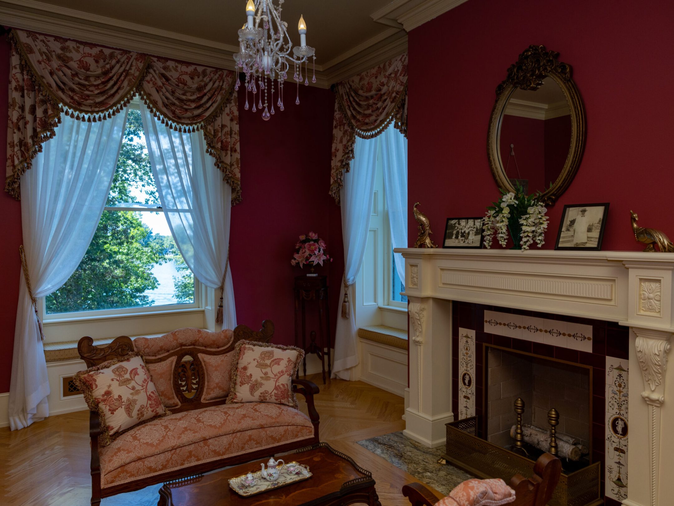 a living room filled with furniture and a fire place
