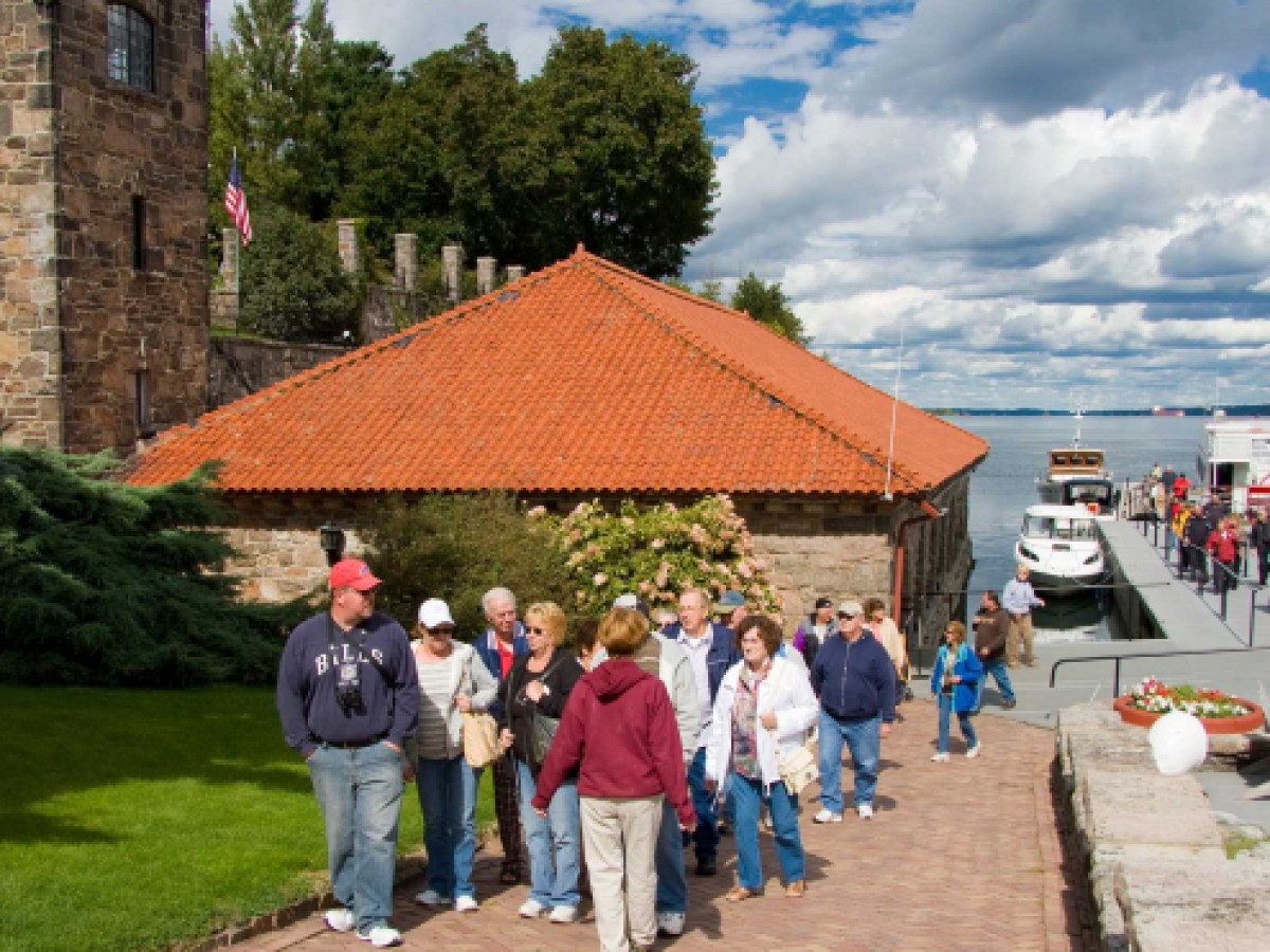 a group of people standing in front of a crowd