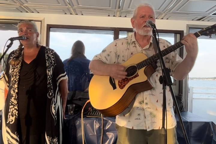 a man holding a guitar