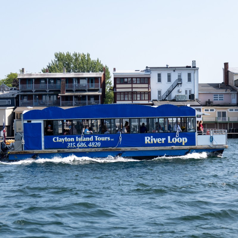 a boat traveling along a body of water